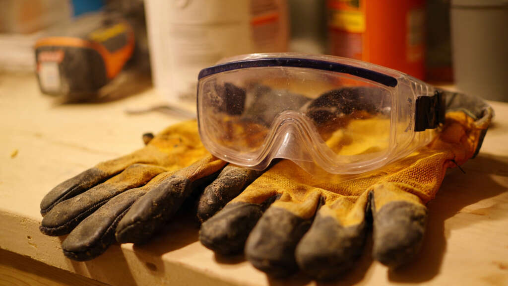 Emphasizes the learning and mentorship aspect of DIY workshops, showing collaboration and instruction.