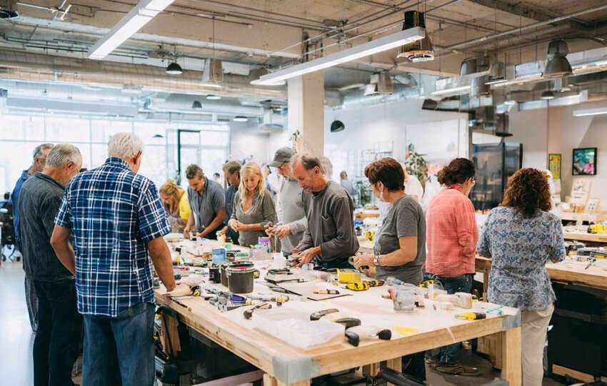 Homeowners attending a hands-on DIY home improvement class