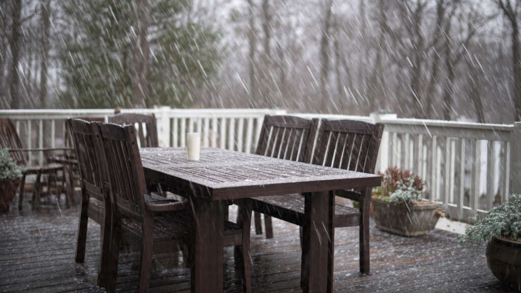 Polywood outdoor furniture resisting harsh weather conditions like rain, sun, and snow.