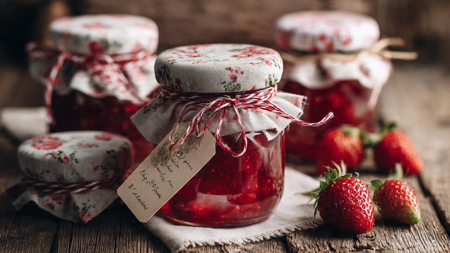 Strawberry jelly in decorated jars ready for gifting